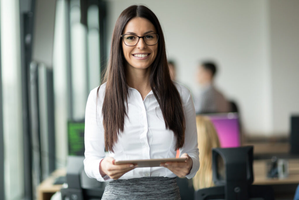 Businesswoman working in information technology company office