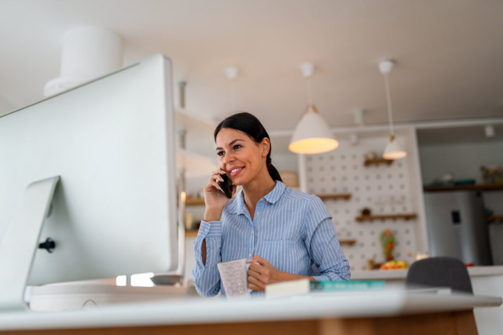 Successful positive caucasian business woman, executive, recruitment, product manager, work from home, looks at computer screen, satisfied with the result